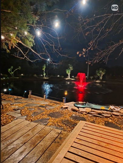 Boardman Lawncare nighttime pond, fountain and landscape lighting