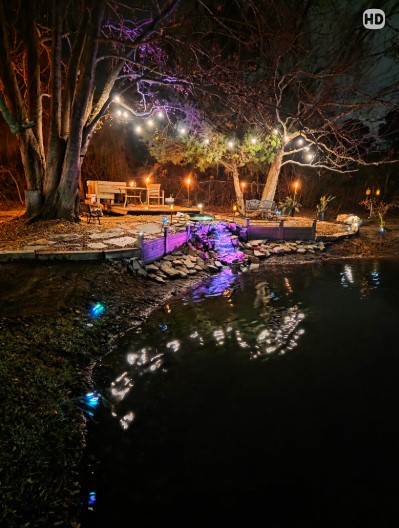 Boardman Lawncare nighttime pond, fountain and landscape lighting